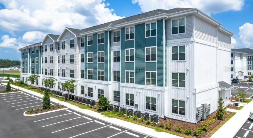 18772 Grand Live Oak Blvd, Unit A21 in Land O Lakes, FL - Building Photo