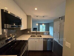 10607 W Dartmouth Ave in Lakewood, CO - Foto de edificio - Building Photo