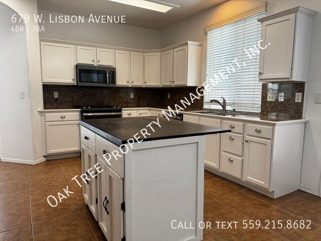 679 W Lisbon Ln in Clovis, CA - Building Photo - Building Photo