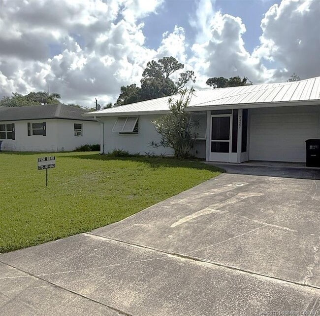 property at 2427 NW Holiday Ct