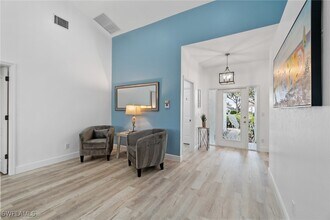 7112 Falcons Glen Blvd in Naples, FL - Foto de edificio - Building Photo