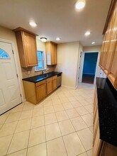 28 Purdue Rd, Unit PH-2 in Glen Cove, NY - Foto de edificio - Building Photo