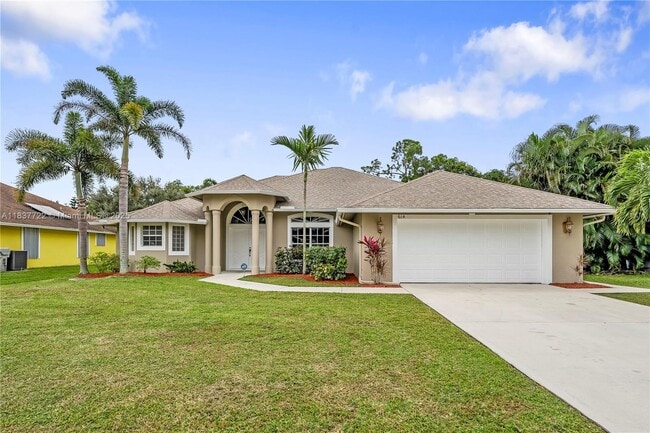 property at 614 SW Twig Ave