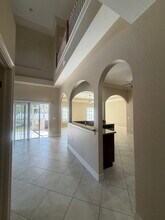 10998 Goodwin St, Unit A in Bonita Springs, FL - Foto de edificio - Building Photo
