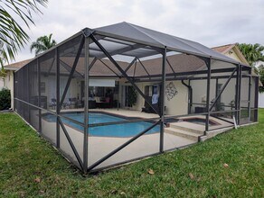 3747 Woods Walk Blvd in Wellington, FL - Building Photo - Building Photo