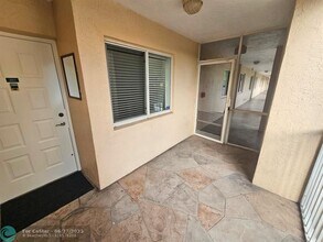 9537 Weldon Cir in Tamarac, FL - Building Photo - Building Photo