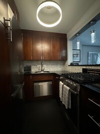 153 E 57th St, Unit 153 E 57th St. Apt 9J in New York, NY - Building Photo - Building Photo