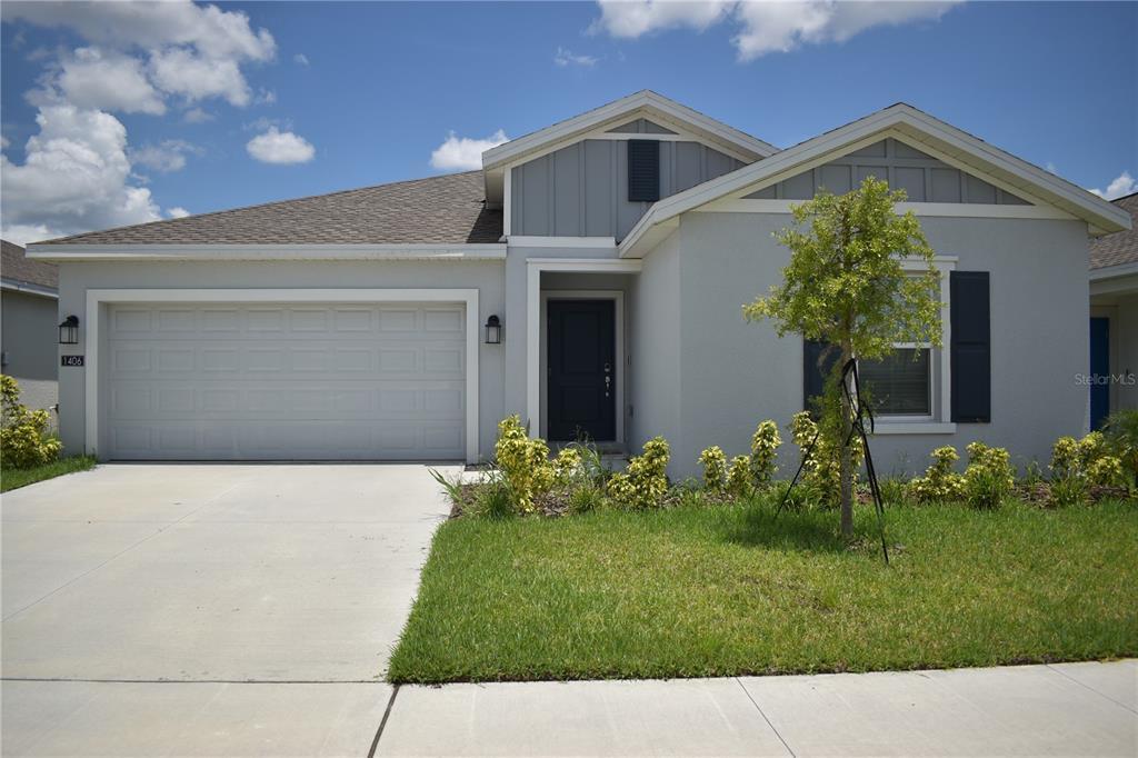 1406 Deepwater Cir in Eagle Lake, FL - Building Photo