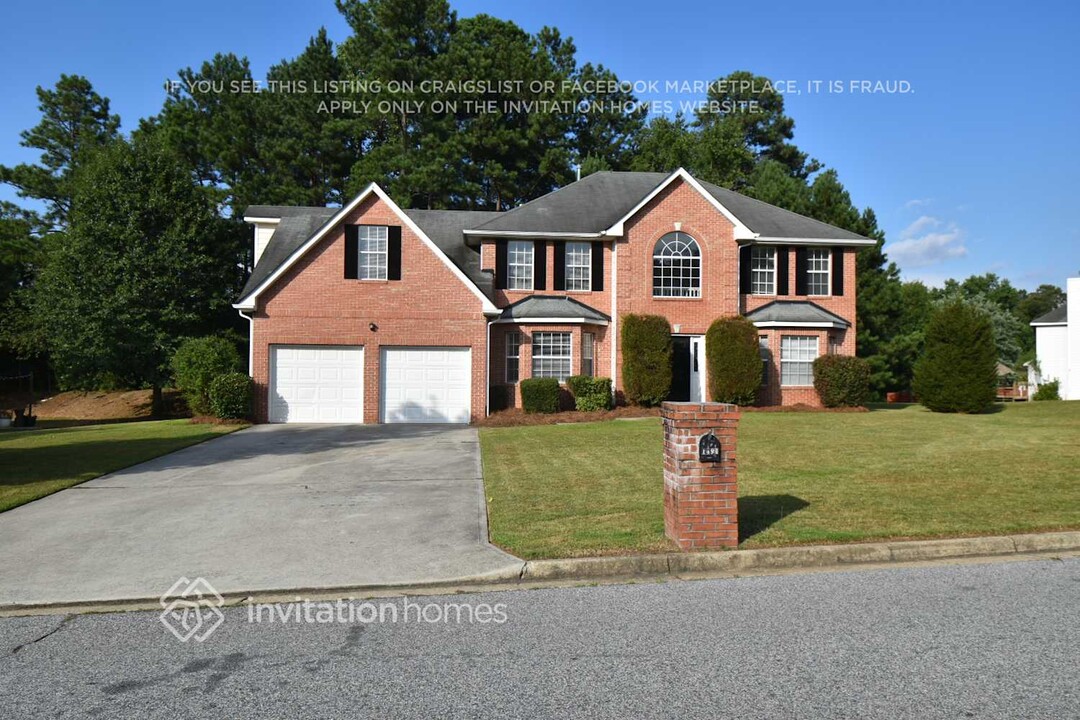 1494 Rogers Crossing Dr in Lithonia, GA - Building Photo