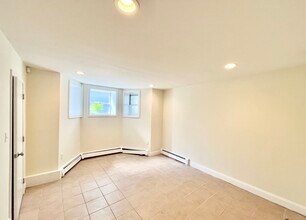 59 Fort Ave, Unit 1 in Boston, MA - Foto de edificio - Building Photo