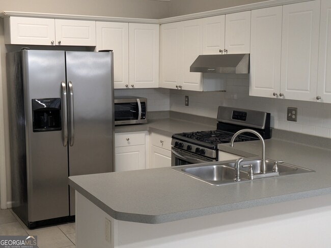 1422 Fountain View Dr in Lawrenceville, GA - Foto de edificio - Building Photo