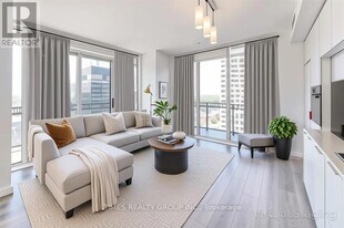 8 Eglinton Ave E in Toronto, ON - Building Photo