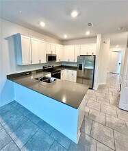 7477 Stone Crk Trl in Kissimmee, FL - Building Photo - Building Photo