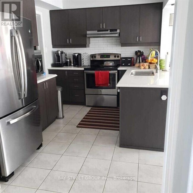 1574 Farmstead Dr in Milton, ON - Building Photo - Building Photo