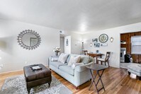 Living Room From Front Door - Estates at Cheyenne Blvd Apartments in Colorado Springs, Colorado