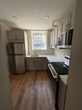 31 Kirk St, Unit 31-1 in Lowell, MA - Foto de edificio - Building Photo