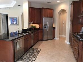 2547 Marquesa Royale Ln-Unit -3-201 in Naples, FL - Building Photo - Building Photo