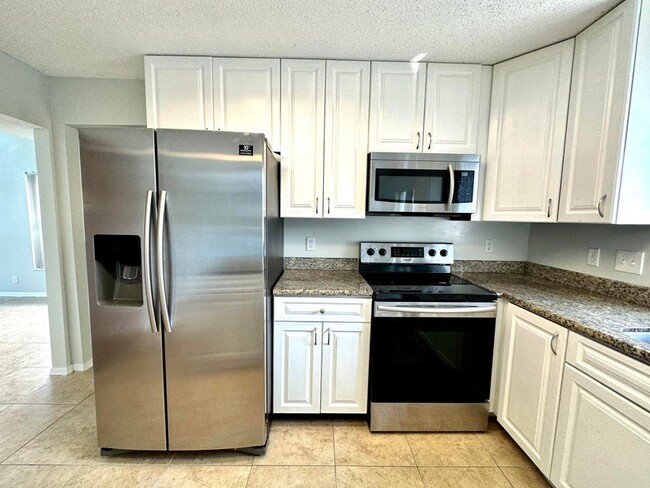 2698 Linkside Dr in Wellington, FL - Building Photo - Building Photo