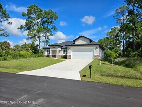 561 Harrisburg St SW in Palm Bay, FL - Building Photo - Building Photo