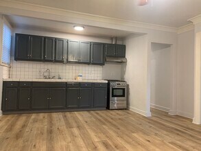 1234-1236 Rolland Curtis Pl in Los Angeles, CA - Building Photo - Building Photo