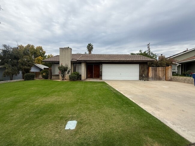 Spacious 4-Bedroom Home in Northeast Baker in Bakersfield, CA - Building Photo - Building Photo