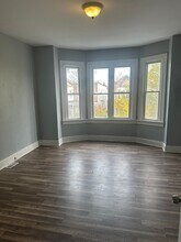 1406 Poplar Grove St in Baltimore, MD - Building Photo - Building Photo