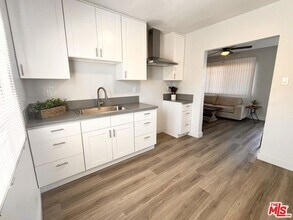 4416 San Pedro St, Unit 1234 in Los Angeles, CA - Building Photo - Building Photo