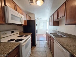 1858 N Decatur Blvd, Unit 104 in Las Vegas, NV - Building Photo - Building Photo