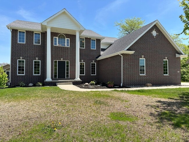 property at 909 NE Williamsburg Dr