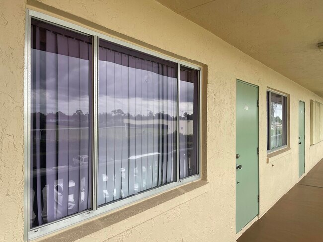 400 Village Green Cir W in Palm Springs, FL - Building Photo - Building Photo