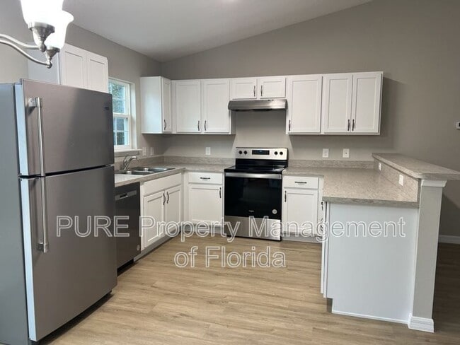 309 Malauka Run in Ocklawaha, FL - Building Photo - Building Photo