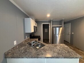 831 N Pontiac Trail in Walled Lake, MI - Building Photo - Building Photo