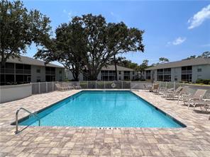 1406 Churchill Cir-Unit -P-102 in Naples, FL - Building Photo