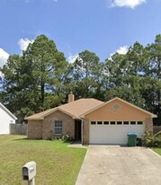 14064 Woodmont Dr in Gulfport, MS - Building Photo