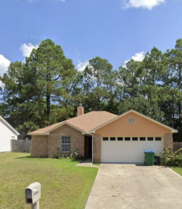 14064 Woodmont Dr in Gulfport, MS - Building Photo