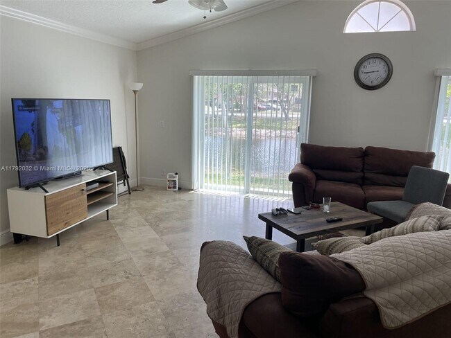 3790 NW 23rd Pl in Coconut Creek, FL - Building Photo - Building Photo