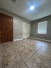216 NW 15th St, Unit 216 in Belle Glade, FL - Foto de edificio - Building Photo