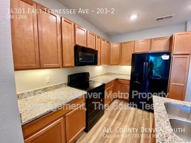 14301 E Tennessee Ave, Unit 203-2 in Aurora, CO - Foto de edificio - Building Photo