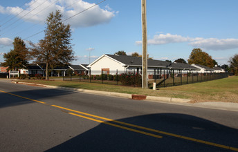 Four Oaks Village Apartments in Four Oaks, NC - Building Photo - Building Photo