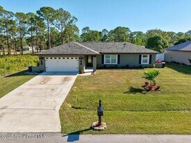 411 Wildwood Ave SW, Unit 11205 in Palm Bay, FL - Building Photo