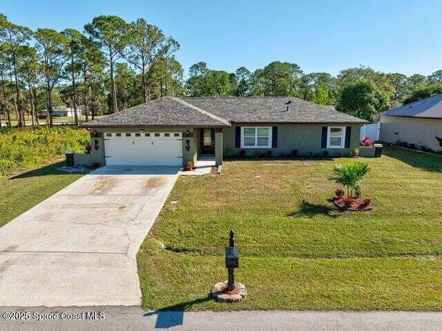 411 Wildwood Ave SW, Unit 11205 in Palm Bay, FL - Building Photo