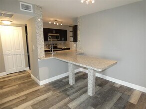 2890 N Oakland Forest Dr-Unit -201 in Oakland Park, FL - Building Photo - Building Photo