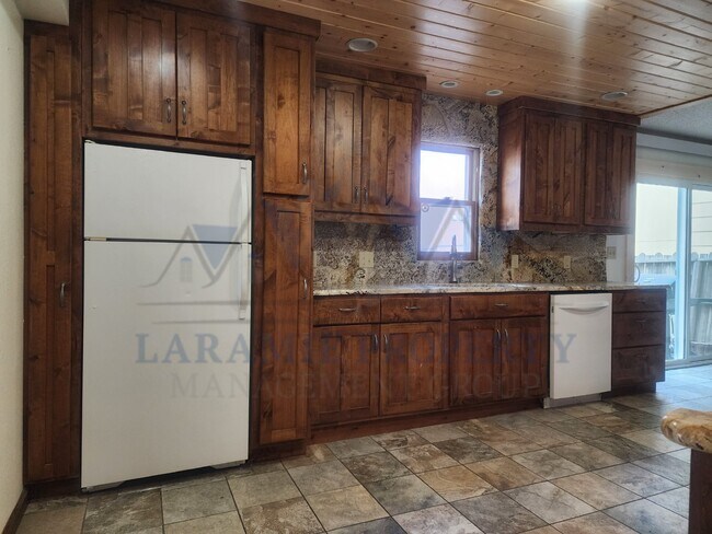 522 S Lincoln St, Unit Apt E in Laramie, WY - Building Photo - Building Photo