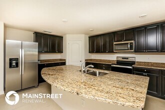 35681 Rose Moss Ave in Leesburg, FL - Foto de edificio - Building Photo