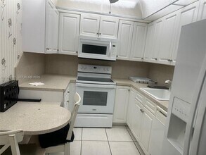1200 St Charles Pl in Pembroke Pines, FL - Building Photo - Building Photo