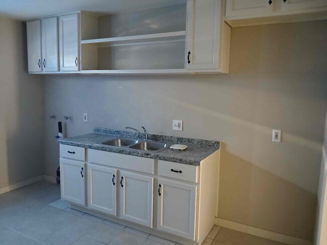 property at 7712 Walker Ave