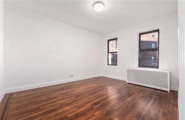 property at 44-14 Newtown Rd