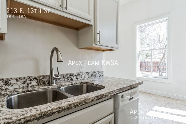 property at 213 E 13th St