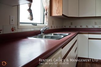 Roomy Half Duplex Near Schools & Amenities in Lethbridge, AB - Building Photo - Building Photo