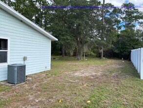 2829 Nordman Ave in New Smyrna Beach, FL - Foto de edificio - Building Photo
